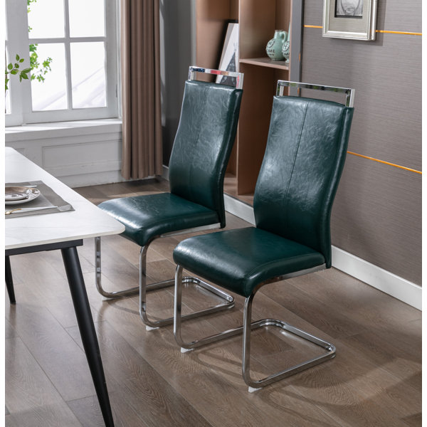 Ivy Bronx Adelin Leather Mid Century Modern Cantilever Dining Chair